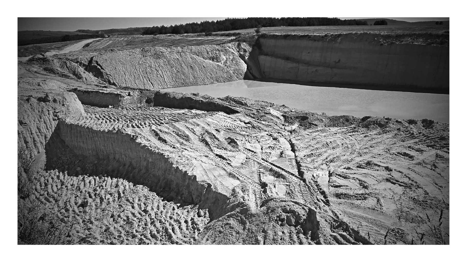 Frente de arranque en cantera de arena